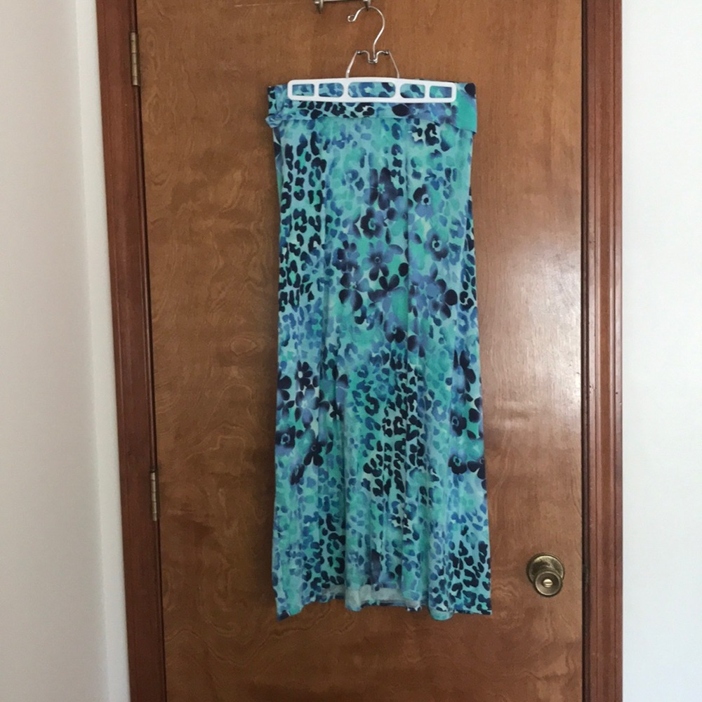 Long colorful skirt.